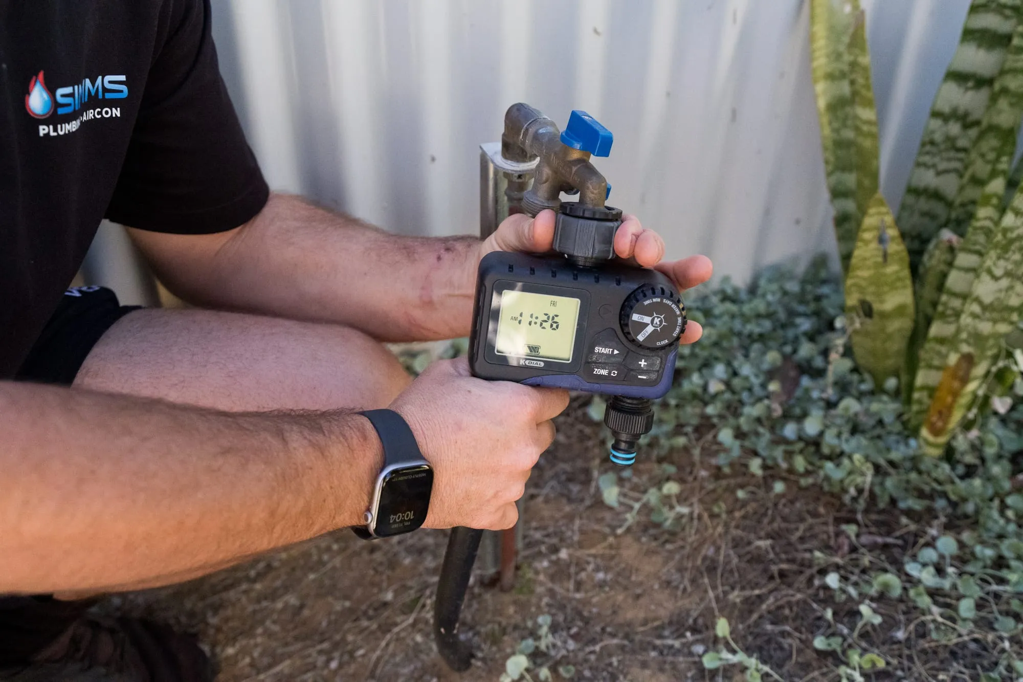 Handheld gas leak detector in use outdoors