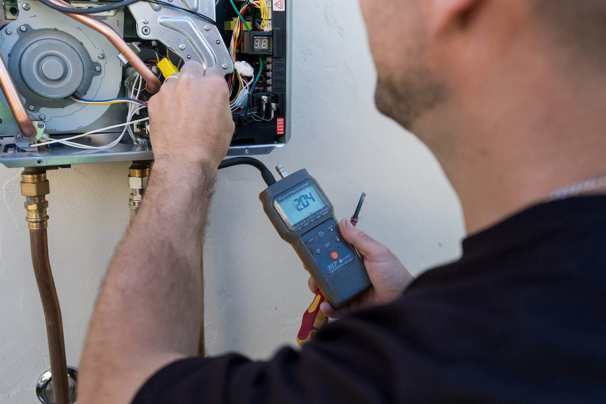 Testing a gas hot water unit with a meter