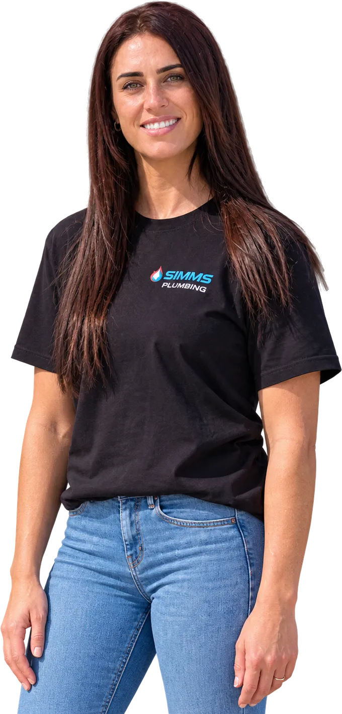 A member of the Simms family in a Simms Plumbing T-shirt